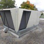 A rooftop unit installed with coil guards