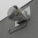 Horizontally mounted commercial ventilation for a paint shop installed by AireCom