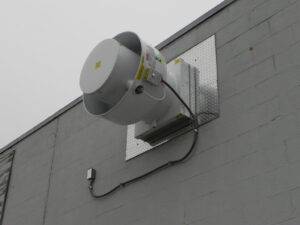 Horizontally mounted commercial ventilation for a paint shop installed by AireCom